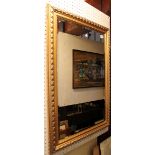 Large gilt framed bevelled edge mirror