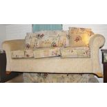 Pair of new upholstered three seater sofas, one being fold out sofa bed