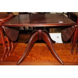 Mahogany dropleaf coffee table on splayed supports 128 x 64cm