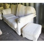 Cream upholstered two seater settee and a cream upholstered armchair