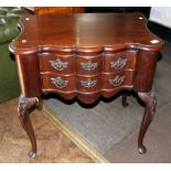 Serpentine fronted mahogany two drawer console table on cabriole feet, W ~ 75cm