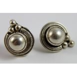 Silver very heavy ornate stud earrings