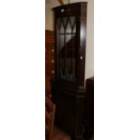 Mahogany glazed corner cupboard with detail cornice to top