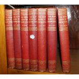 Seven volumes of The New Book Of Knowledge, hardback vintage books