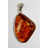 Sterling silver large amber pendant, approximately 4cm