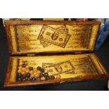 Eastern style wooden games board with pieces to inside