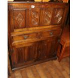 Old Charm drinks cabinet with linenfold detail to front, two drawers over one cupboard, 91 x 118cm