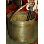 Large brass coal or log bucket with tongs and poker