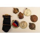 Four 1940s sports medals, Distinguished Service bar, fob etc