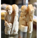 Pair of boars tooth ivory carved Okimono figures