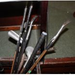 Quantity of vintage golf clubs