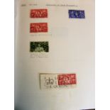 Four albums of used world stamps, early to late 20th century