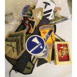 Fifty USA Military patches plus various other badges