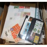 Box and album of Great Britain mint stamps