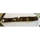 Leather belt with eight cap and collar military badges