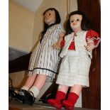 Two large dressed dolls