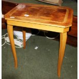Walnut side table with flatware contents