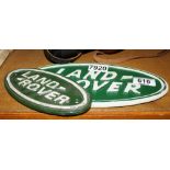 Two cast iron Land Rover signs