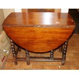 Oak drop leaf table on barleytwist supports