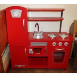 Childs painted red kitchenette