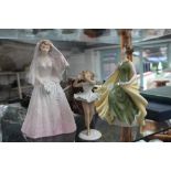 Two Royal Doulton figures The Bride, Alexandra and a German figurine