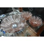 Art Deco style pink coloured glass bowl and six matching smaller bowls