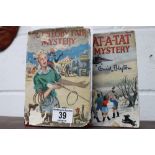 Two Enid Blyton hardback books, The Ratatat Mystery and one other