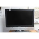 Panasonic LCD TV with control and instructions