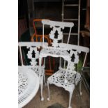 Three metal garden chairs