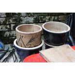 Four ceramic garden plant pots