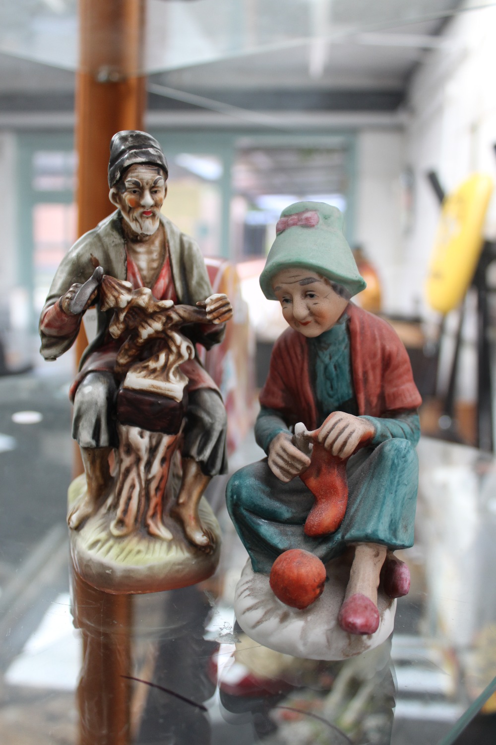 Two ceramic glazed figurines