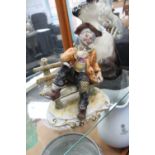 Capodimonte figure of a tramp on bench