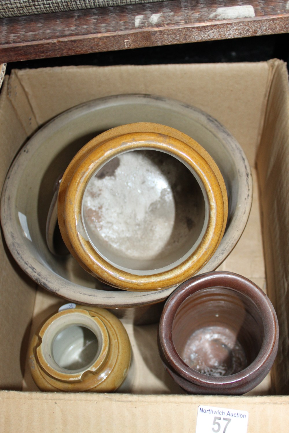Box of stoneware items including jars