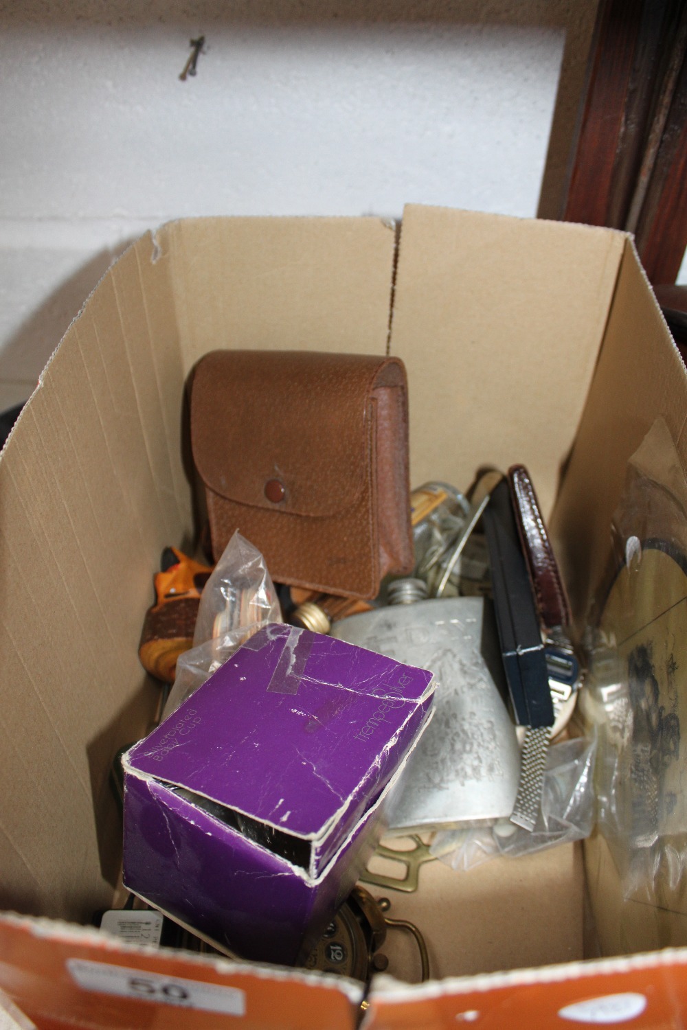 Box of mixed items including hip flask, pipe and silver plated baby cup