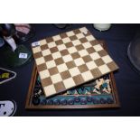 Wooden and glazed top complete chessboard