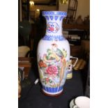 Large Oriental style vase on plinth