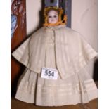 Victorian ceramic German doll with original clothing