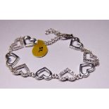 Sterling silver stone set hearts bracelet