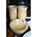 Two Chinese yellow marble bowls and pots