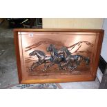 Copper picture in high relief of travelling horses