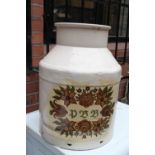 Metal container with floral detail to front