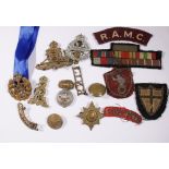 MILITARY BADGES. Box of military and R.A.F badges, pips etc