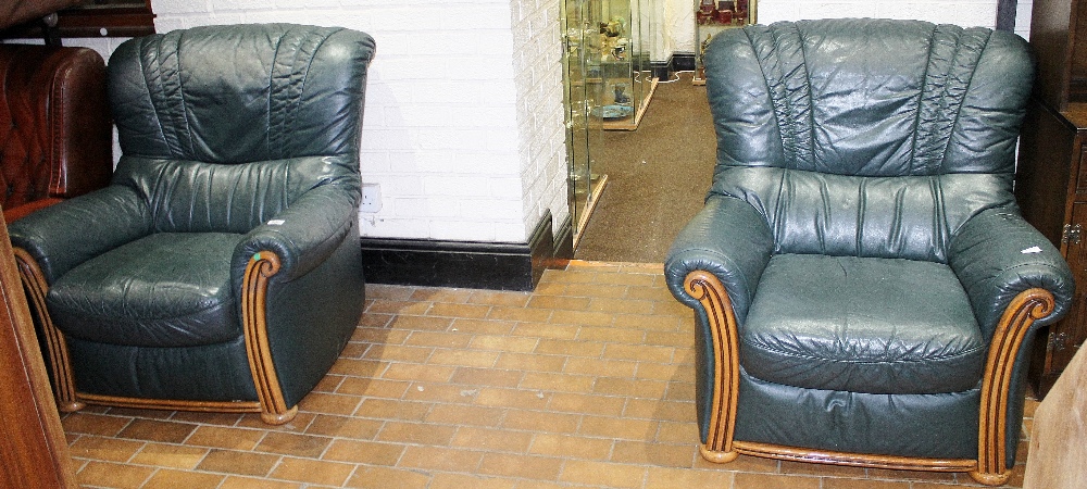 ARMCHAIRS. Pair of green leather armchairs