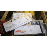 FIRST DAY COVERS. Four albums of first day cover postage stamps including some mint. approximately