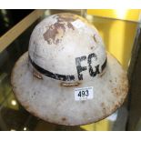 WW2 FIREMANS HELMET. WWII metal Firemans helmet marked FG, from Trafford Park Manchester.