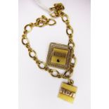 GOLD BRACELET. 10k gold bracelet and badge from RCA
