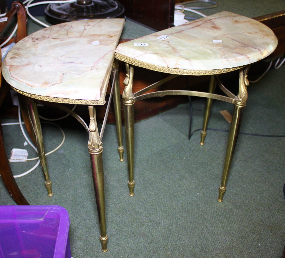 BRASS & ONYX TABLES. Pair of half moon brass and onyx tables