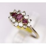 CLUSTER RING. 9ct gold ruby and CZ cluster ring, size M/N