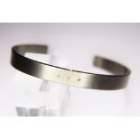 TITANIUM BRACELET. Titanium diamond set bracelet