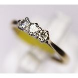 DIAMOND RING. 18ct gold and platinum vintage 1950s three stone diamond ring, size L/M
